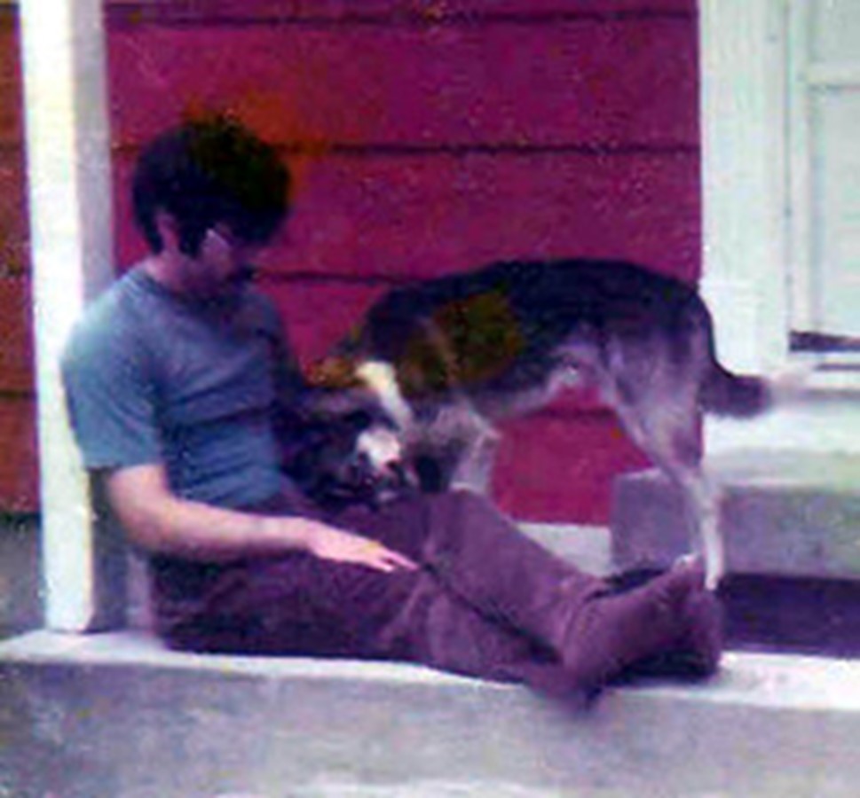 My young husband and his first dog, Packy the husky.